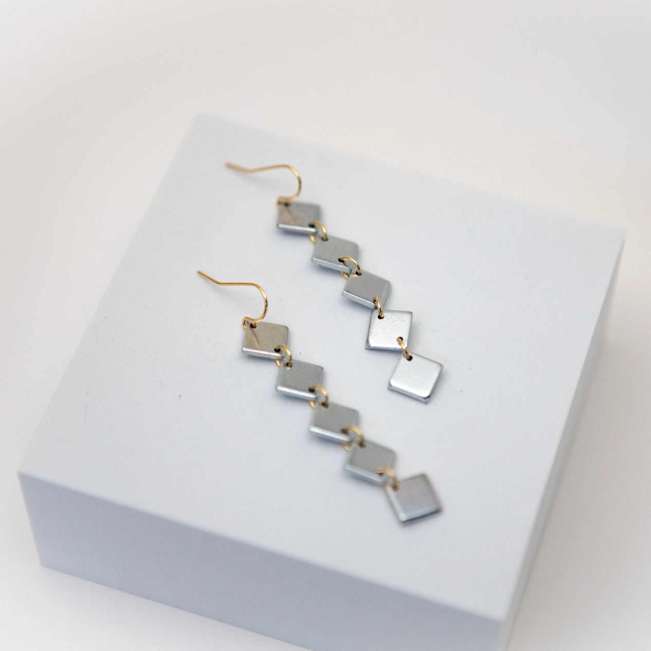 Turn A Corner Earrings Mend